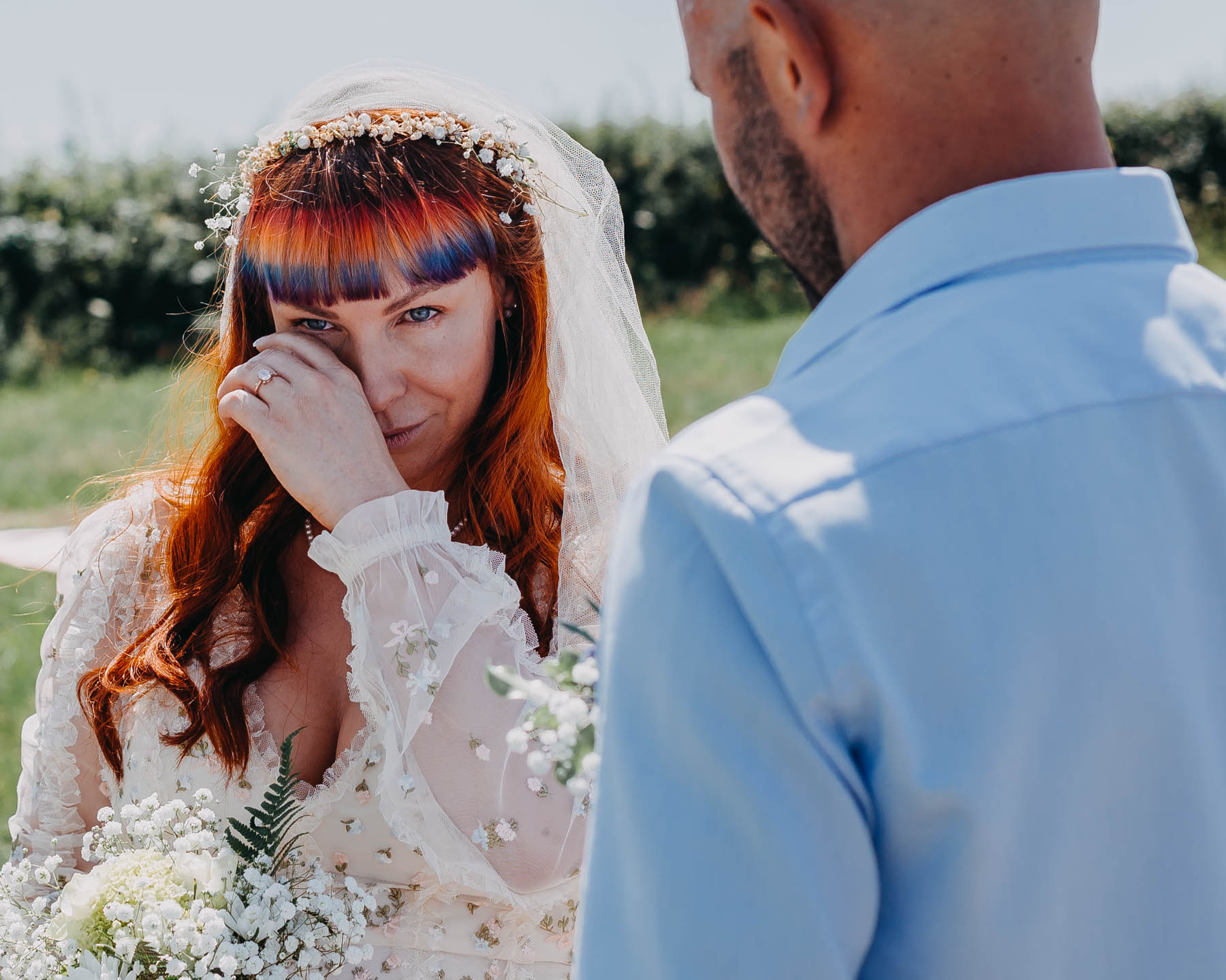Tears in the eyes of the bride before the handfasting ceremony