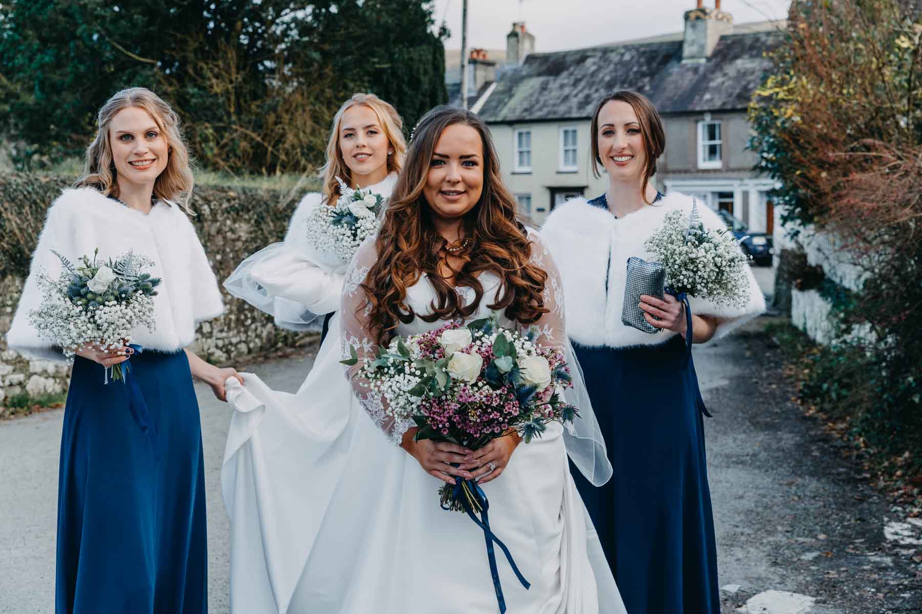 Natural wedding photography Wales - the bride with her bridesmaids
