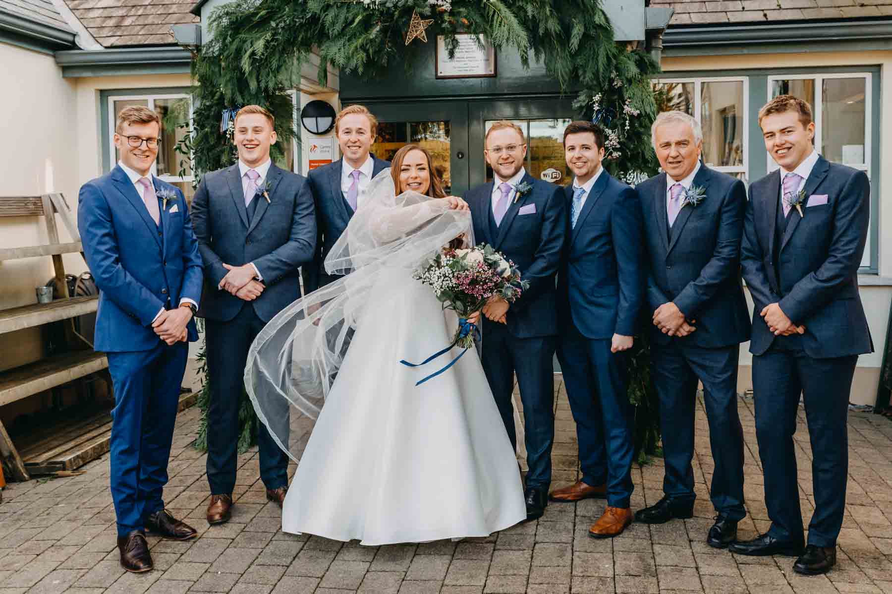 Bride and groom and groomsmen - natural wedding photography Wales