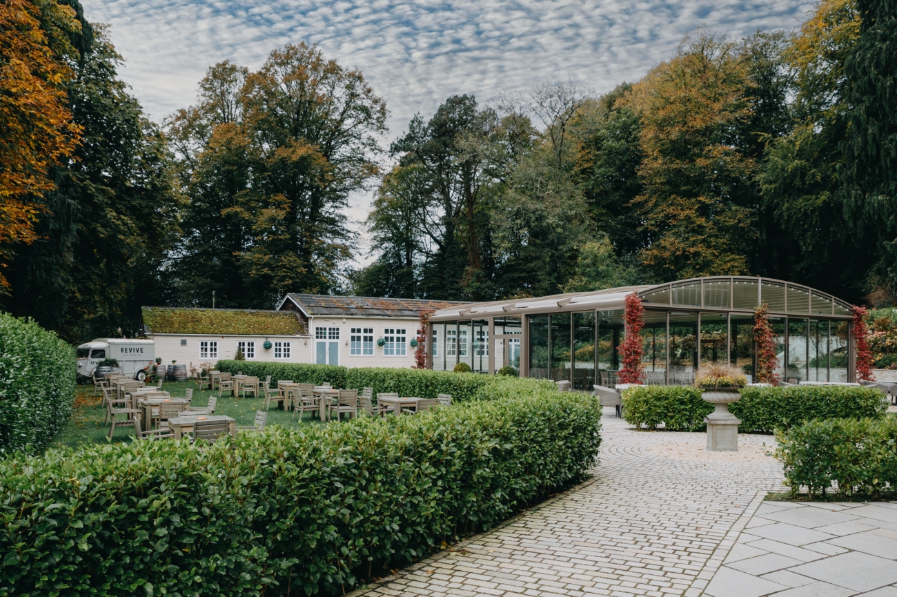 The beautiful outdoor wedding space at Coed-Y-Mwstwr Hotel, a scenic wedding venue in South Wales, perfect for ceremonies and receptions.