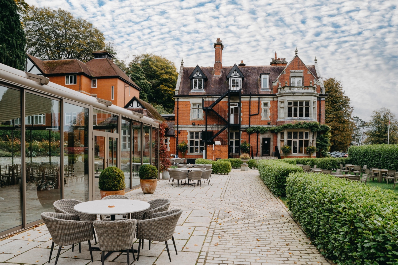 Beautiful courtyard view of Coed-Y-Mwstwr Hotel, a stunning wedding venue near Bridgend, South Wales, offering elegant outdoor spaces for ceremonies and receptions.