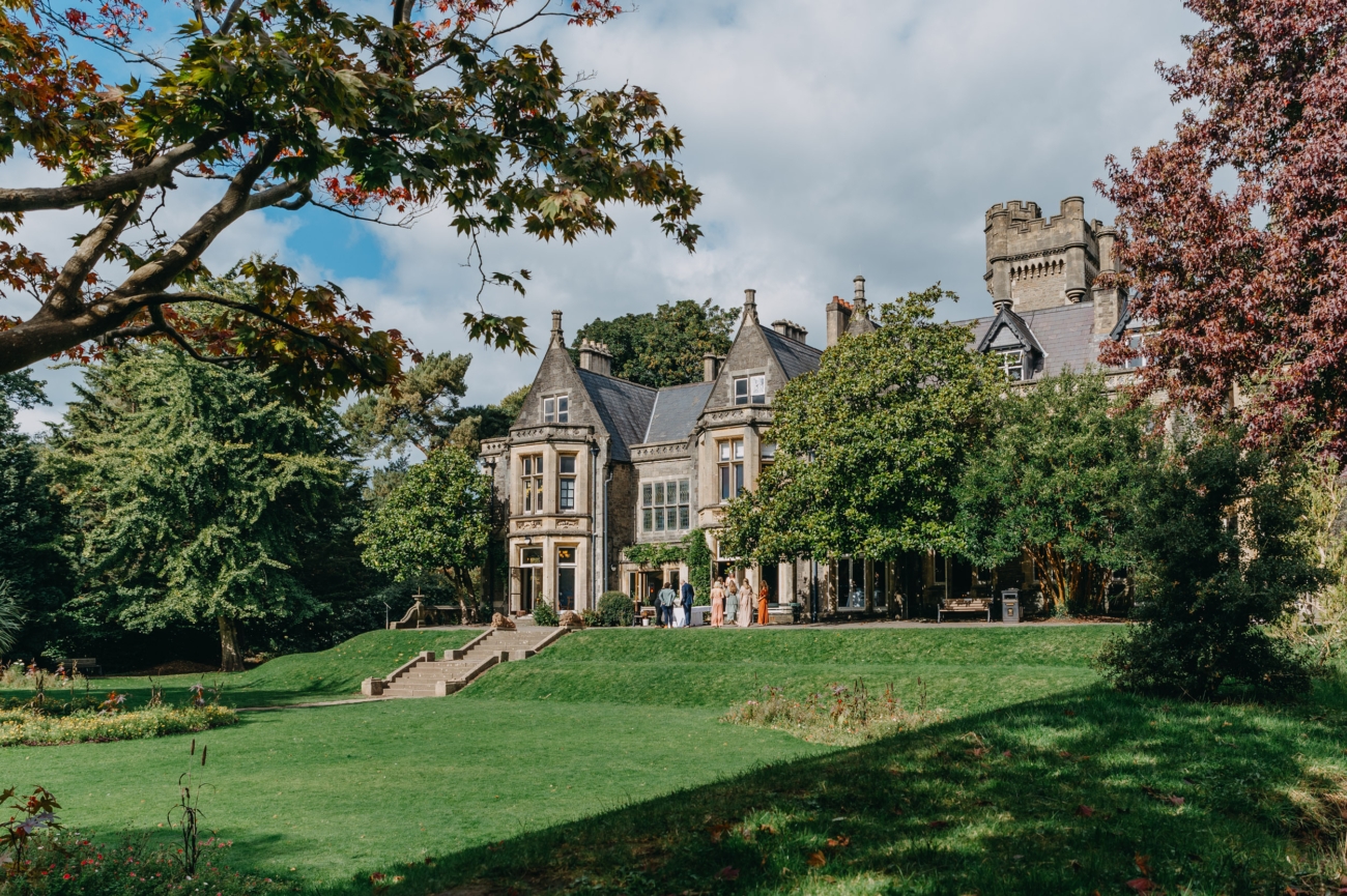 Romantic wedding venue Insole Court in Cardiff, surrounded by lush gardens and stunning Victorian architecture, perfect for couples seeking a picturesque wedding location.