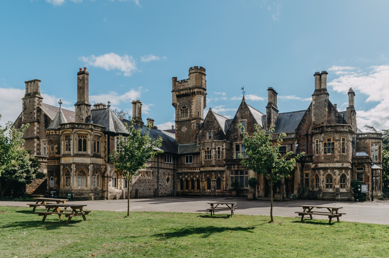 Victorian architecture of Insole Court, a romantic wedding venue in Cardiff surrounded by gardens and historic charm.