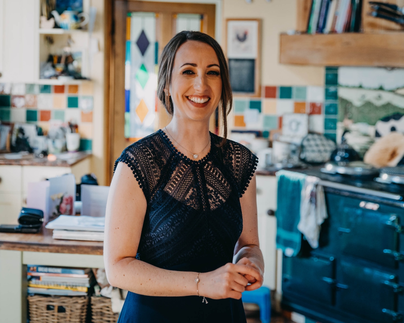 Smiling bridesmaid during relaxed wedding preparations in a Welsh village