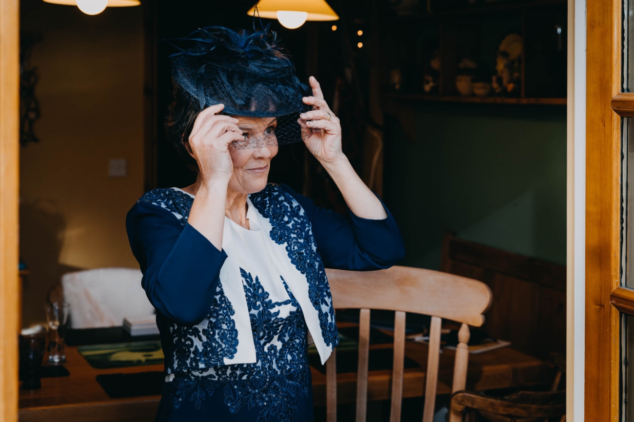 Mother of the bride getting ready for a countryside wedding in Myddfai, Wales