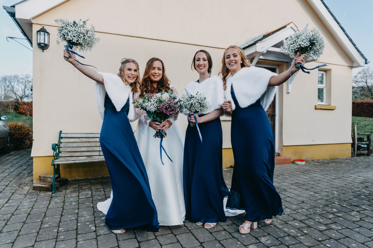 Bride and bridesmaids celebrating outside before the wedding in Myddfai – candid and joyful moment