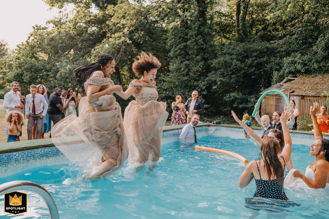 Bridesmaids jumping into swimming pool in dresses at summer wedding – WPJA Glamorgan Spotlight feature