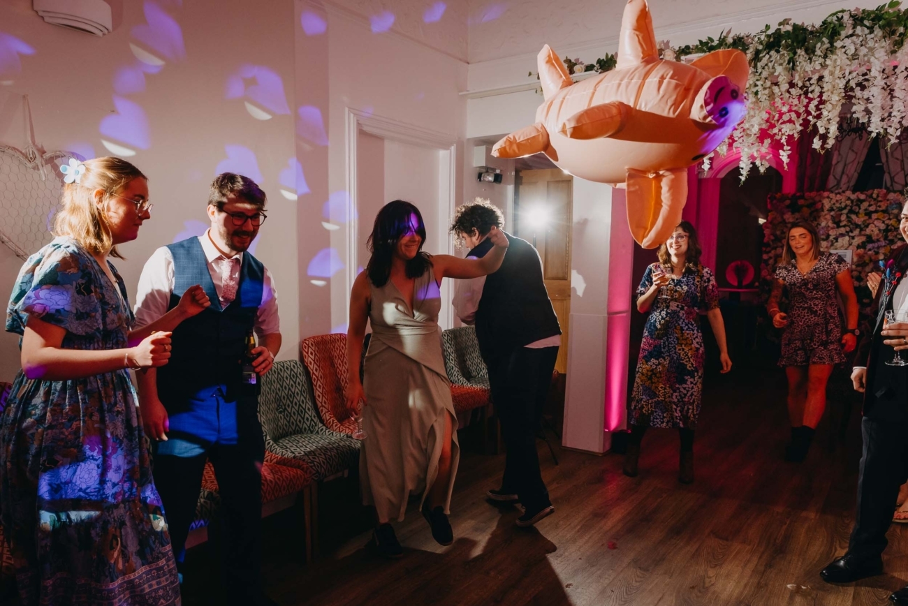 guests dancing during a wedding reception photographed by a South Wales wedding photographer
