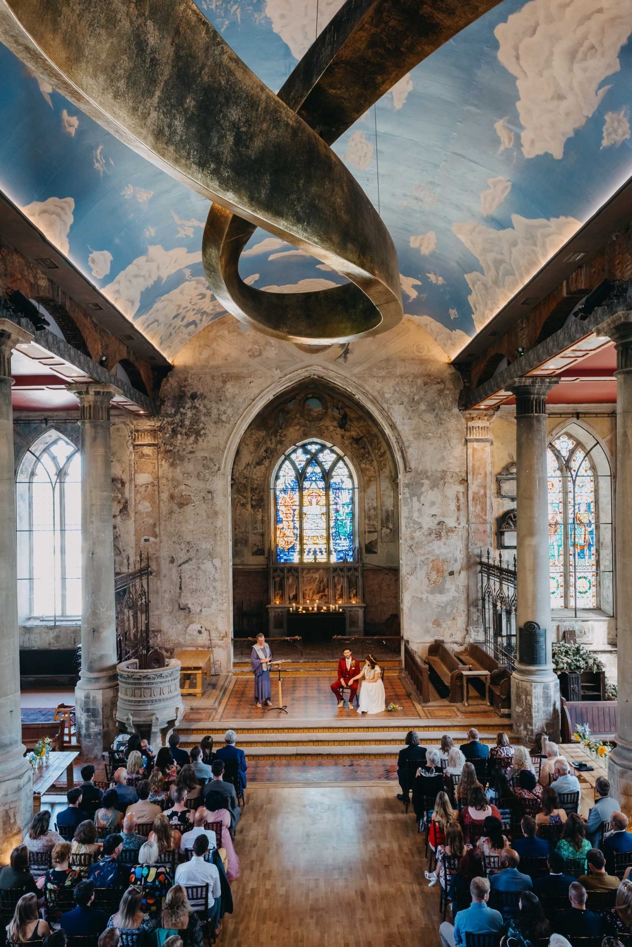Documentary wedding photography at The Mount Without in Bristol showing a wide view of the ceremony captured by a Bristol wedding photographer