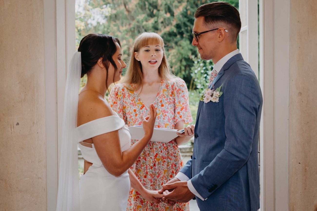 Documentary wedding photography of an intimate ceremony moment in Bath UK captured by a Bristol wedding photographer