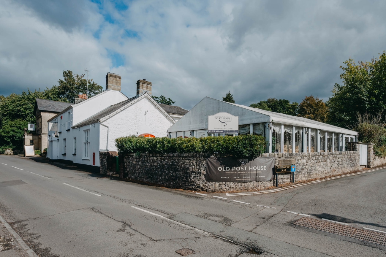 Old Post House wedding venue in Cardiff with its marquee and historic buildings in St Fagans
